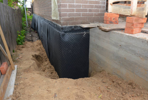 SJ Waterproofing Pros technician performing targeted Exterior Waterproofing assessment in Ragland, AL